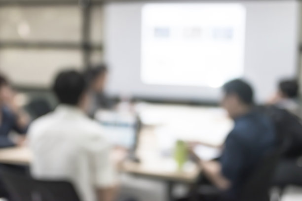模糊办公室会议背景商务人员工作组在会议室的讨论图片下载