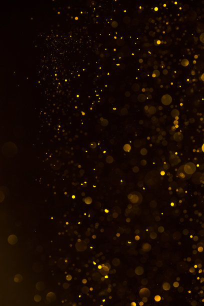 金色的尘埃落下闪亮抽象的散景背景图片下载