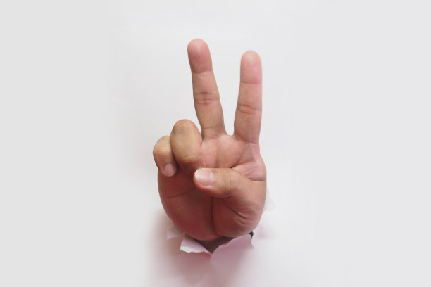 V手势-胜利的手势。图片下载