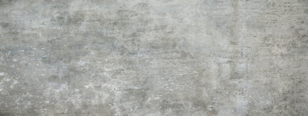长墙背景水平位置。混凝土结构。灰色的水泥表面。图片下载