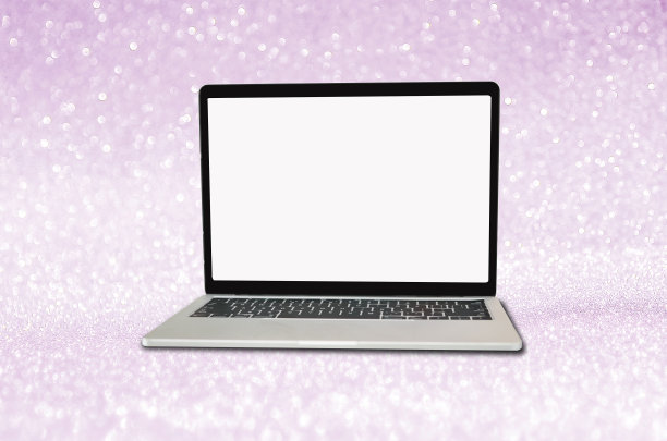 空白笔记本电脑上的紫色闪光背景图片下载