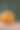雕刻婴儿南瓜的特写照片在木制的背景与蜡烛光手套眼睛和嘴-孤立的对象模糊的背景，万圣节节日广告材料图片下载