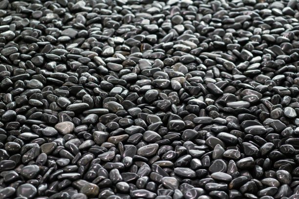背景纹理的大水磨黑卵石图片下载