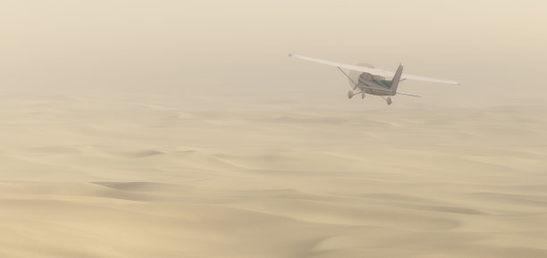 飞机在沙尘暴中飞行图片下载