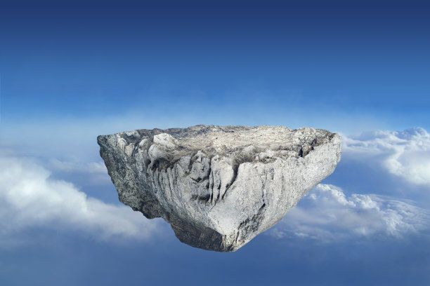 梦幻漂浮在蓝天之上的岩石岛图片下载