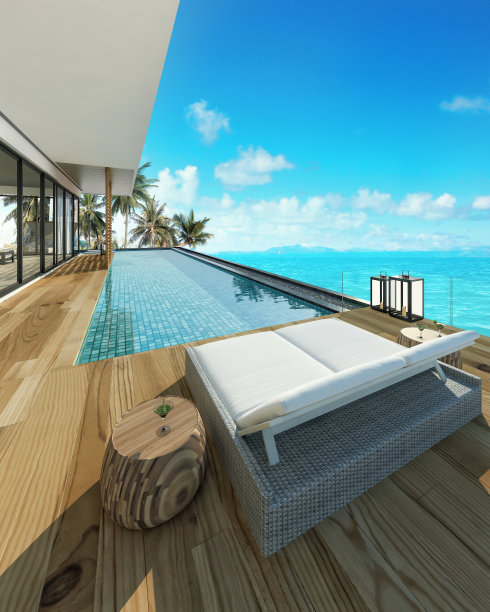 海景游泳池在现代阁楼设计，豪华的海洋海滩房子图片下载