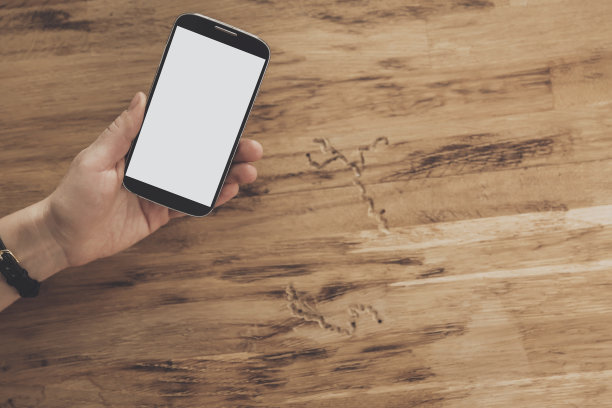 俯视图手持平板电脑移动背景图片下载