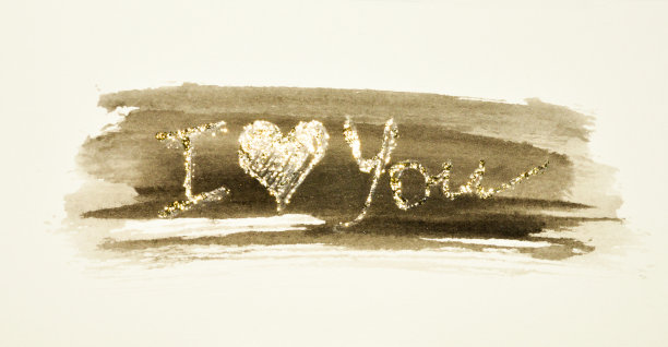 闪闪发光的文字-我爱你-在黑色水彩上喷溅怀旧的色彩，用金色的闪光图片下载