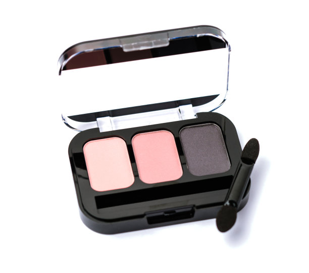 柔和的粉色眼影调色板上孤立的白色。图片下载