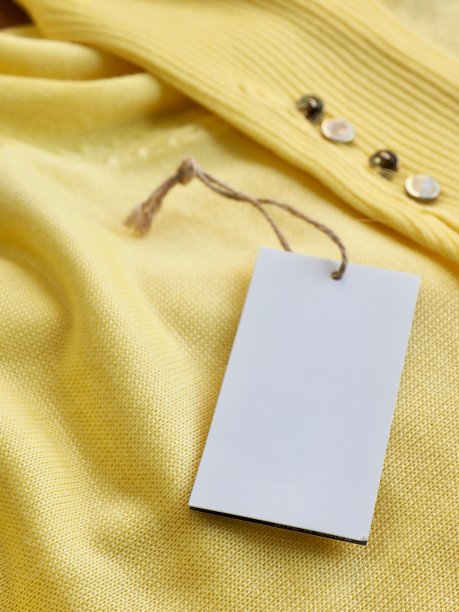 黄色的春季毛衣和服装标签图片下载