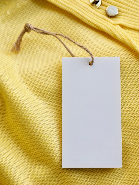 黄色的春季毛衣和服装标签图片下载