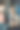 活泼漂亮的健身模特女孩在健身房用哑铃和教练一起训练二头肌图片下载
