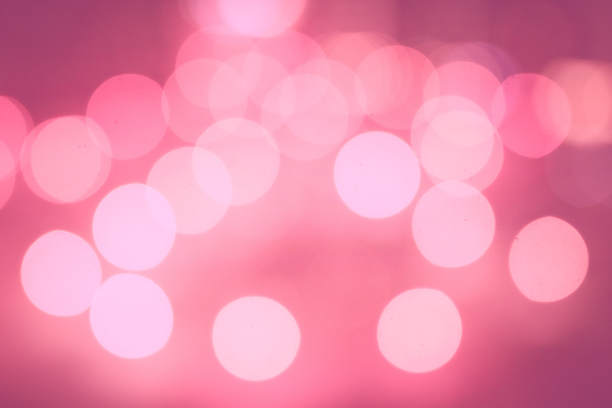 这张照片的主题是2019年季节的实际颜色。模糊抽象的橙色背景与美丽的散景效果。颜色的珊瑚。图片下载