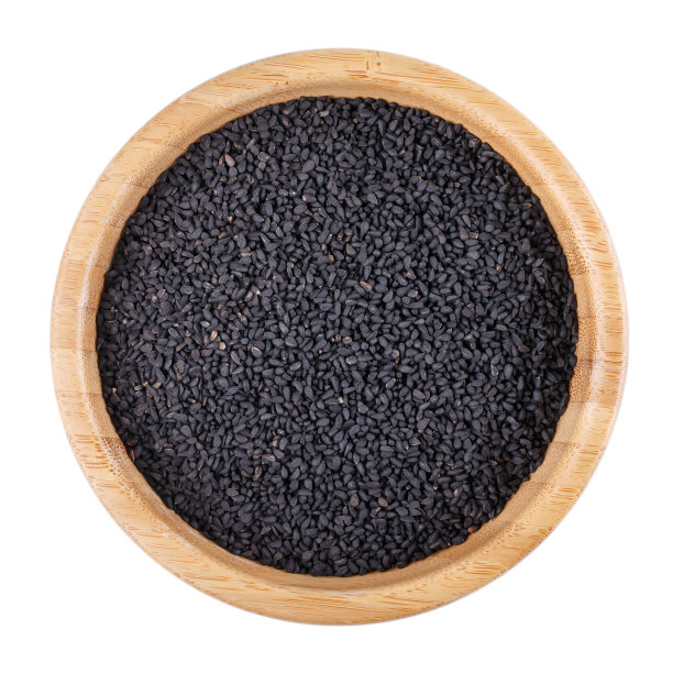 黑色孜然，黑色葛缕子，黑种草籽或卡隆吉种子在木碗上孤立白色。前视图。图片下载