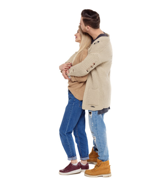 一对时尚夫妇的侧视图。图片下载