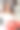 特写的漂亮的年轻女士与时尚的化妆和卷曲的长发。大嘴唇，柔软的皮肤和美丽的眼睛。手触摸脖子图片下载
