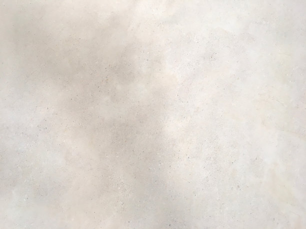 浅灰色混凝土墙面纹理渐变色度。石膏背景后图案粗糙，有污点。图片下载