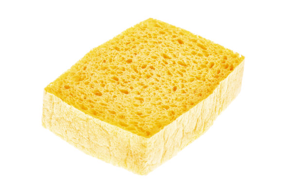 黄色海绵孤立在白色背景上。图片下载