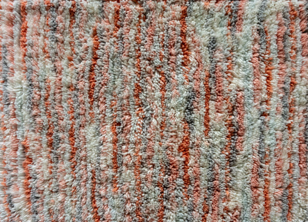 橙色，白色和灰色的地毯纹理为背景图片下载