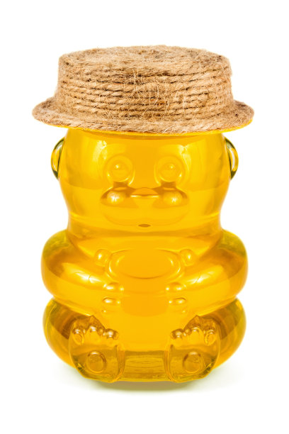 蜂蜜熊在孤立的白色背景图片下载