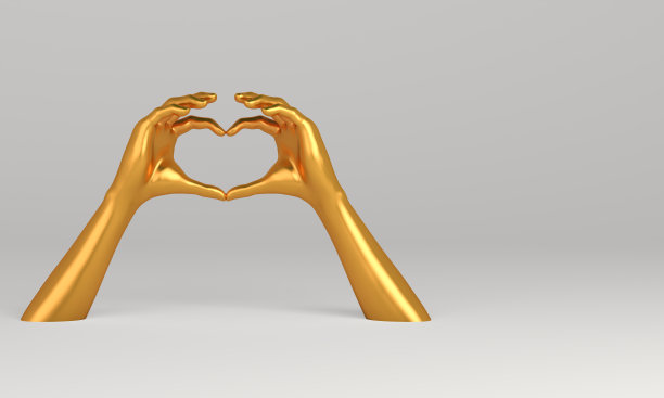 白色背景上的心形金手。图片下载