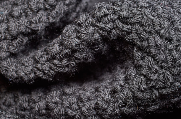 织物图案的微距照片，纺织品服装的近景与浅景深的领域图片下载