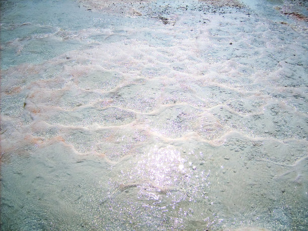 棉花堡,土耳其。的背景图片。在山上的白色石灰岩特写。图片下载