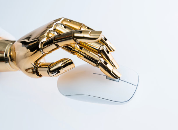 机器人的手使用电脑鼠标图片下载