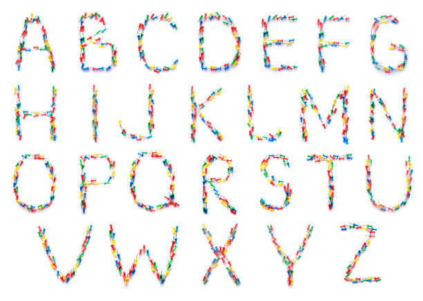 英文字母从多色图钉。素材图片