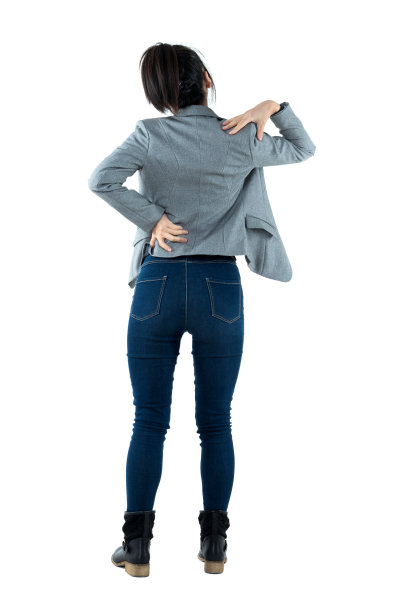 在白色背景上背痛的女商人图片下载