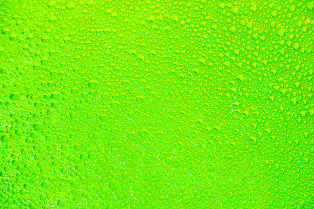 绿黄色的肥皂泡作为背景和质地。图片下载
