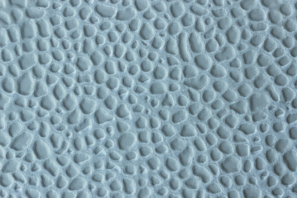 灰色压花瓷砖。抽象的原始背景。图片下载