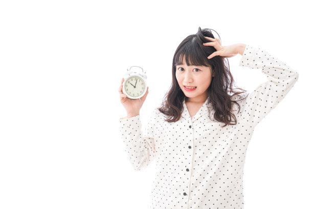 年轻女性睡过头图片下载