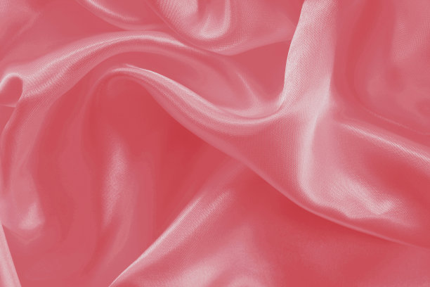 玫瑰金色织物质地为背景和设计，美丽的丝绸或亚麻图案。图片下载