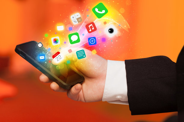 手持智能手机与彩色的应用程序图标图片下载