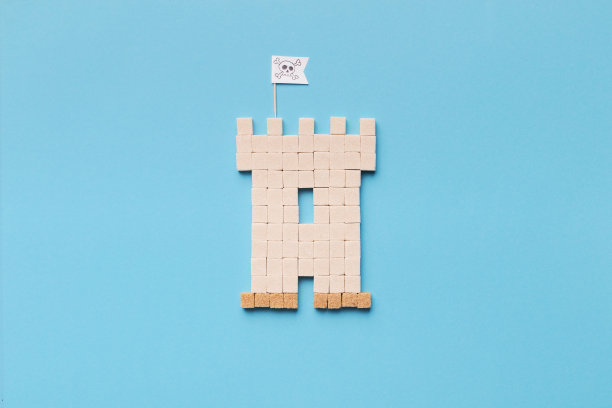 蓝色背景上的方糖城堡图片下载