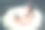 少女在一个粉红色的裙子坐在椅子上白色的毛格子和阅读一本书。图片下载