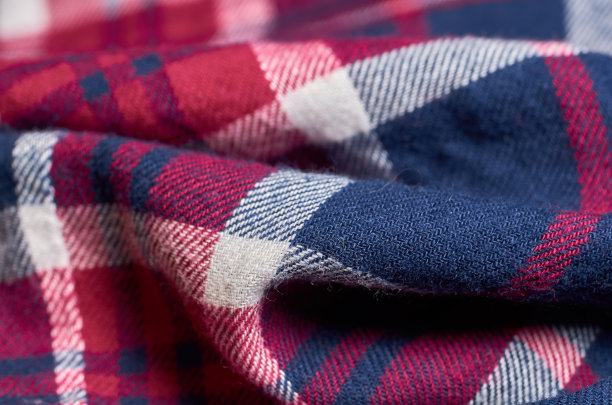 织物图案的微距照片，纺织品服装的近景与浅景深的领域图片下载