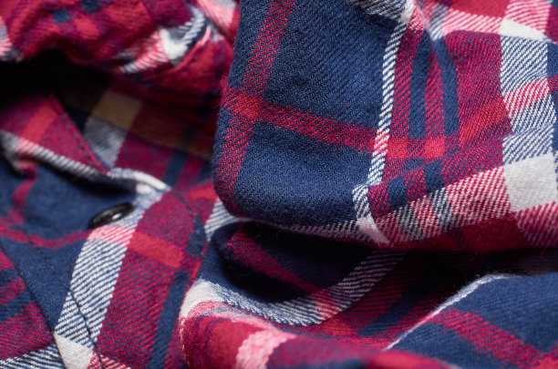 织物图案的微距照片，纺织品服装的近景与浅景深的领域图片下载