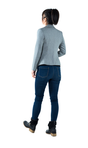 后视图的女商人走在白色的背景图片下载