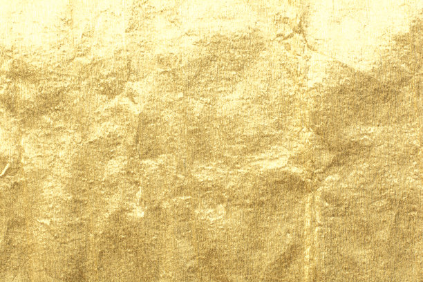 闪亮的热黄金箔金色闪光装饰纹理纸:明亮灿烂的节日金属纹理空壁纸背景:锡金属材料为节日工艺设计装饰图片下载