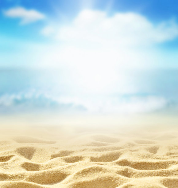 夏天海滩背景。沙子，大海和天空。夏天的概念。图片下载