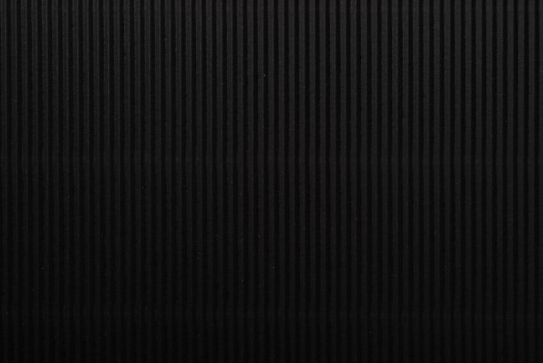瓦楞纸板图案背景垂直于黑色图片下载