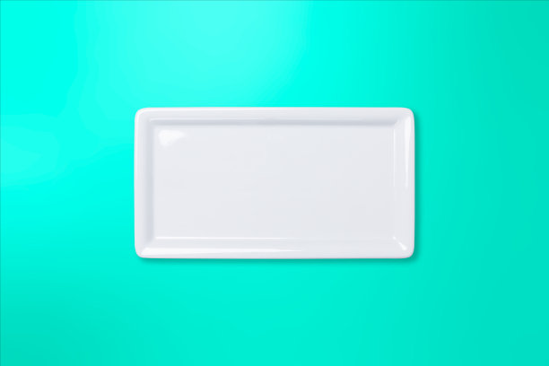空白的白色盘子在蓝绿色渐变背景图片下载