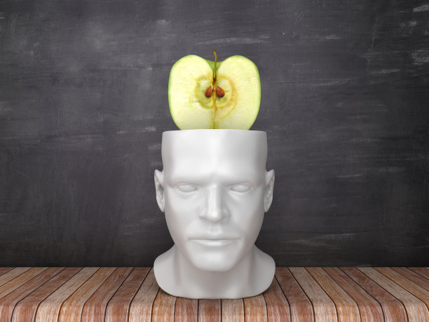 人的头与苹果在黑板上的背景- 3D渲染图片下载