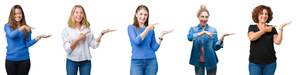 一组美丽的女性在白色孤立的背景下惊奇地微笑着对着相机，同时提出用手和手指。图片下载