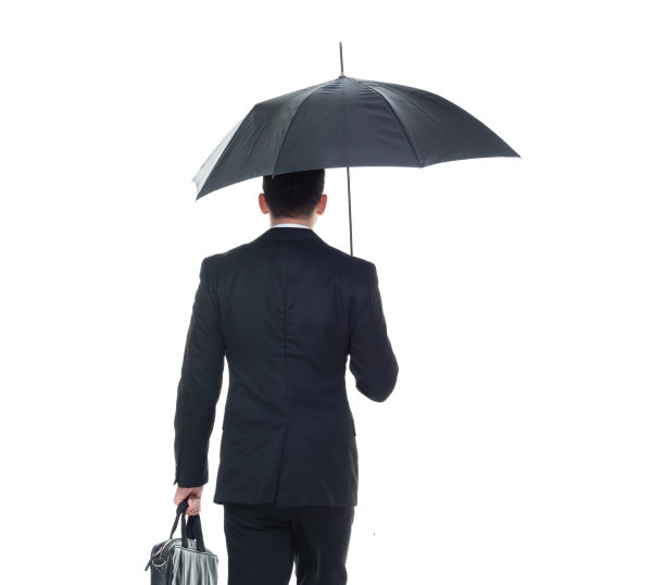 英俊的商人拿着一把伞图片下载