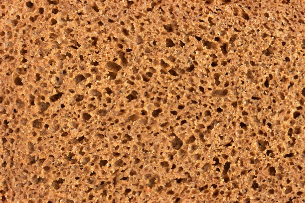 新鲜黑麦面包的质地。图片下载