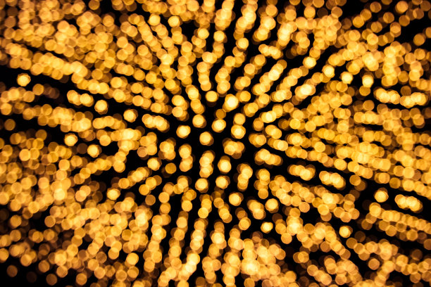 Marquee灯光模糊了城市街道的背景图片下载