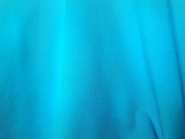 蓝色的织物。图片下载